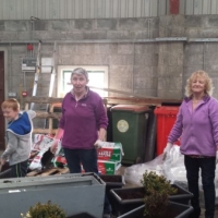 Seán, Mary and Kathleen getting planter boxes ready.jpg